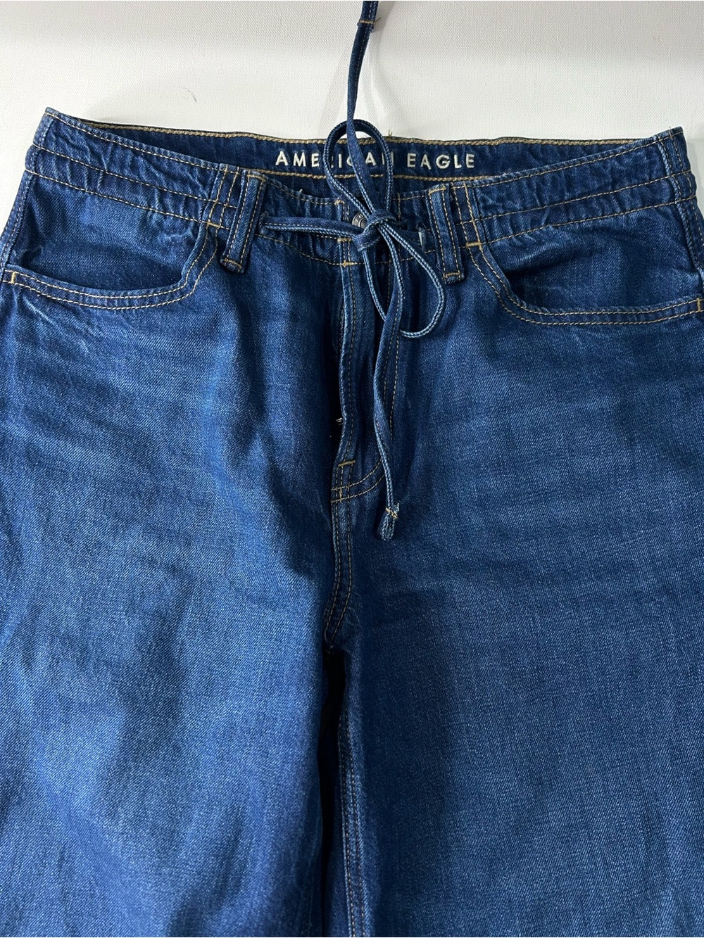 American Eagle Outfitters Women's Dark Blue Flare Jeans with Drawstring Waist